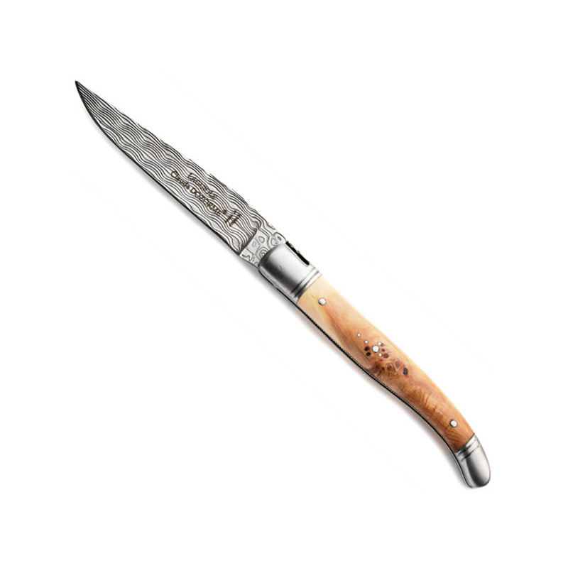 Coltello Laguiole Damasco ginepro, struttura seghettata, cesellato.